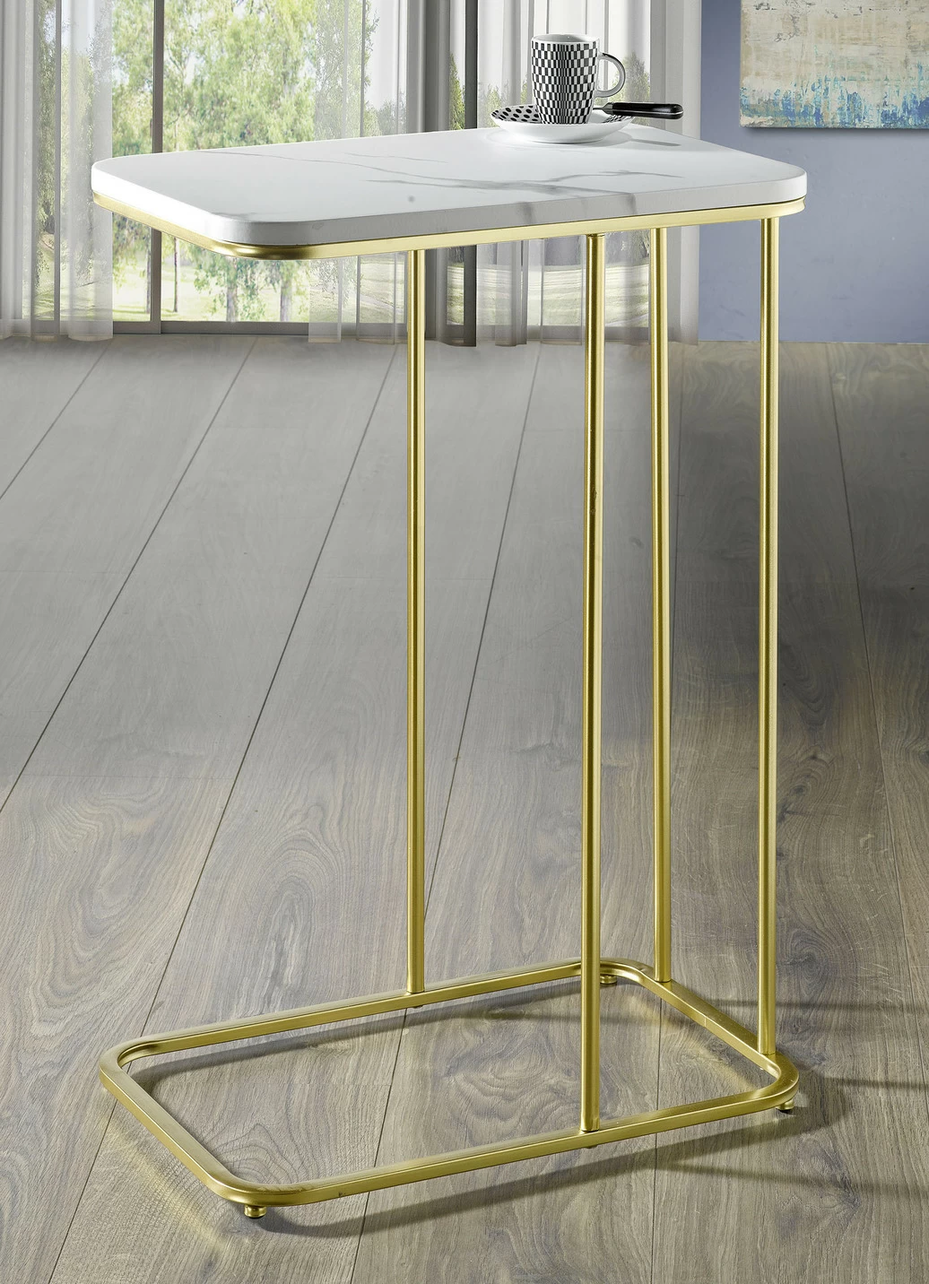 Beistelltisch aus goldfarben lackiertem Stahlrohr