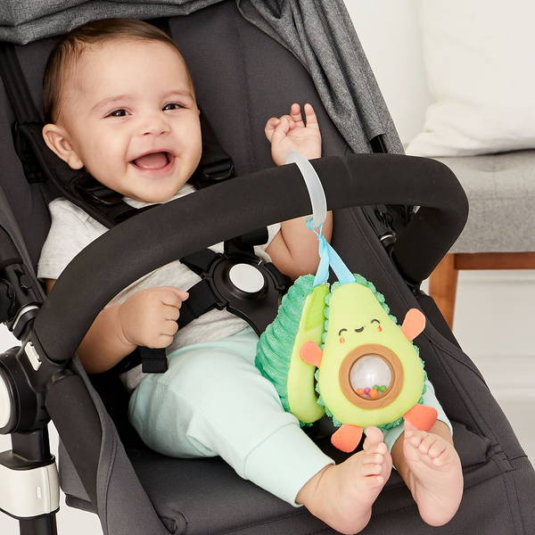 Skip HopSkip Hop   Kinderwagenspielzeug Avocado