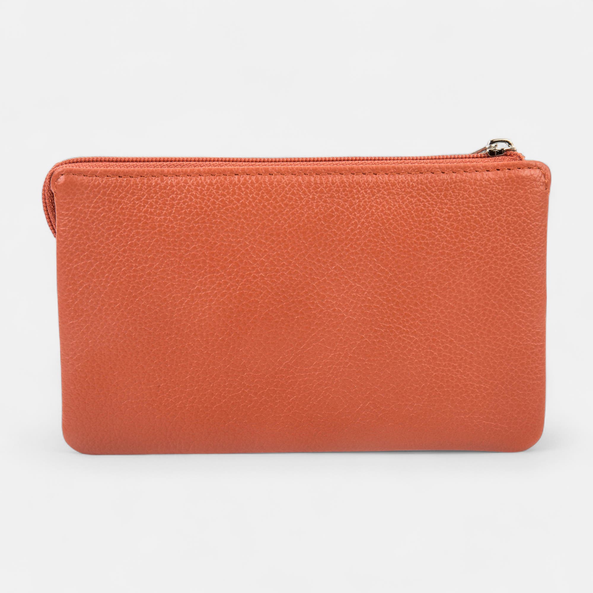 Petite maroquinerie en cuir orange
