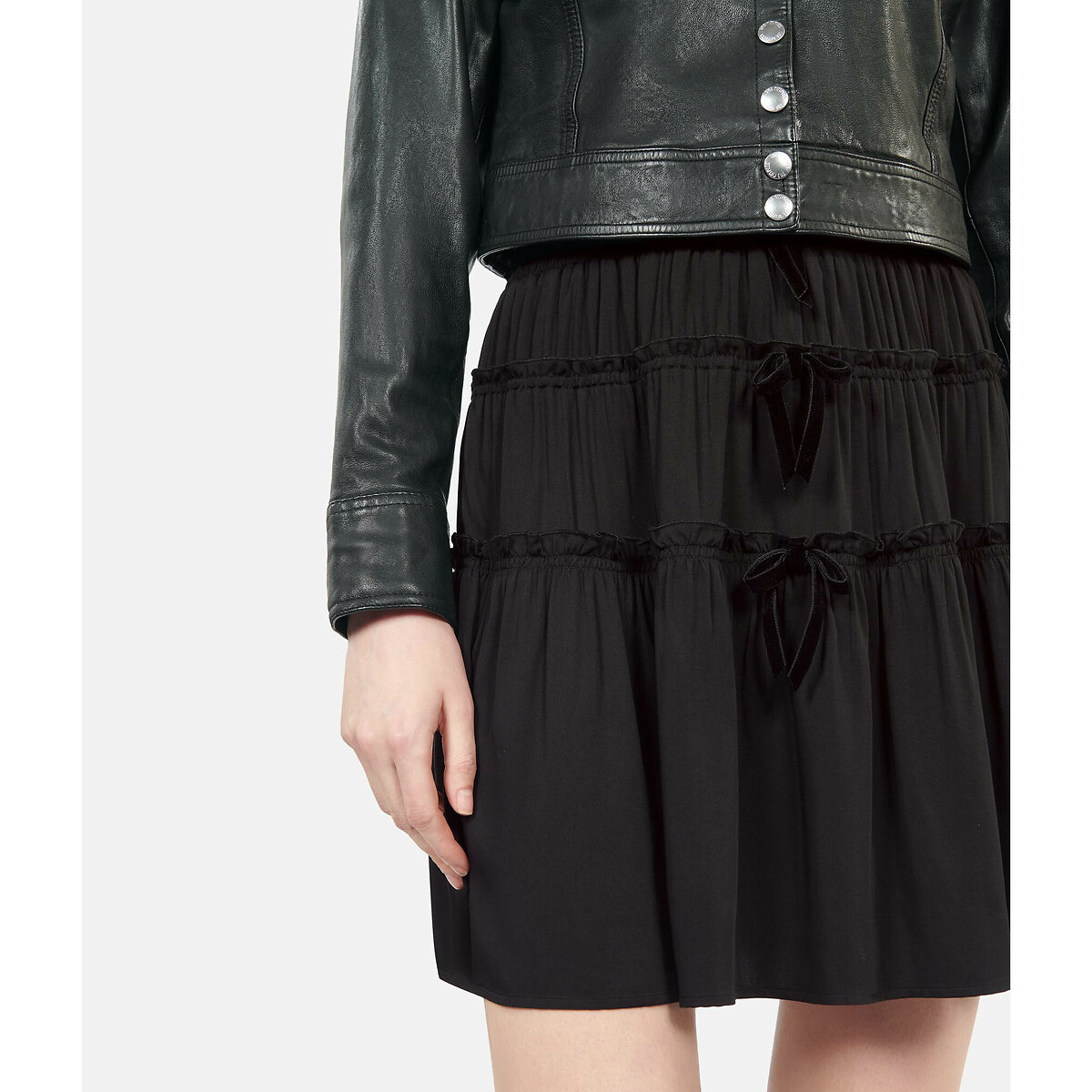 OS KOOPLES<br>Korte rok met volants