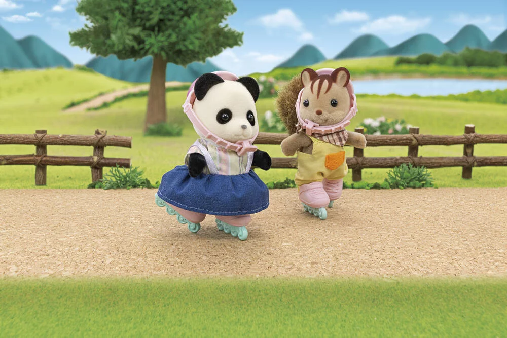 LA FILLE PANDA ET SON VELO AVEC SA REMORQUE - SYLVANIAN VEHICULES
