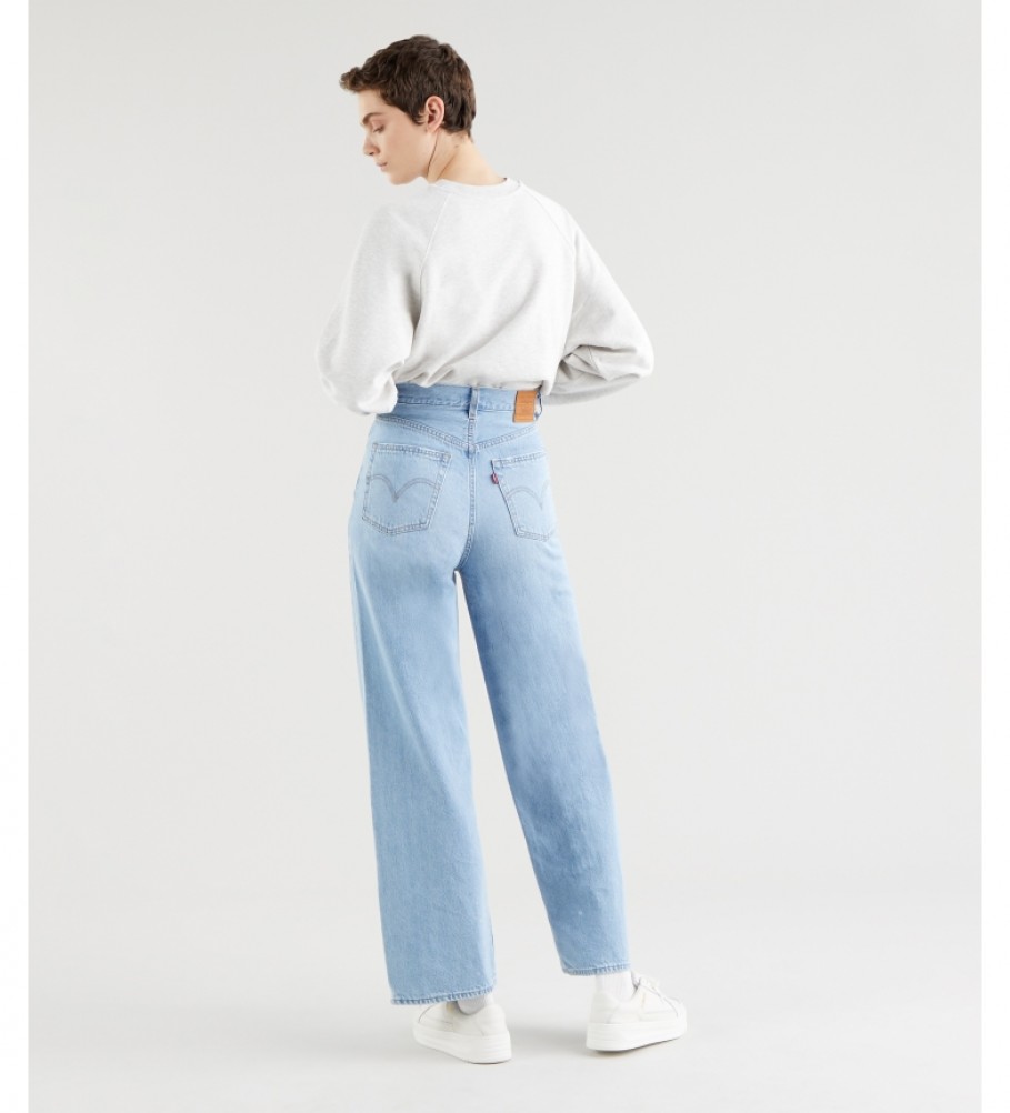 Calça jeans Levi's azul claro, cintura alta, modelagem ampla e modelagem circular.