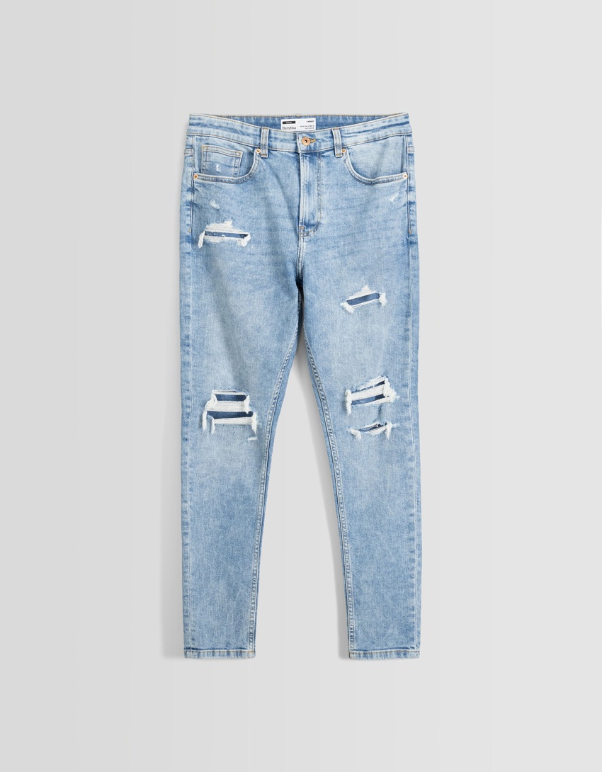 calça jeans cenoura rasgada