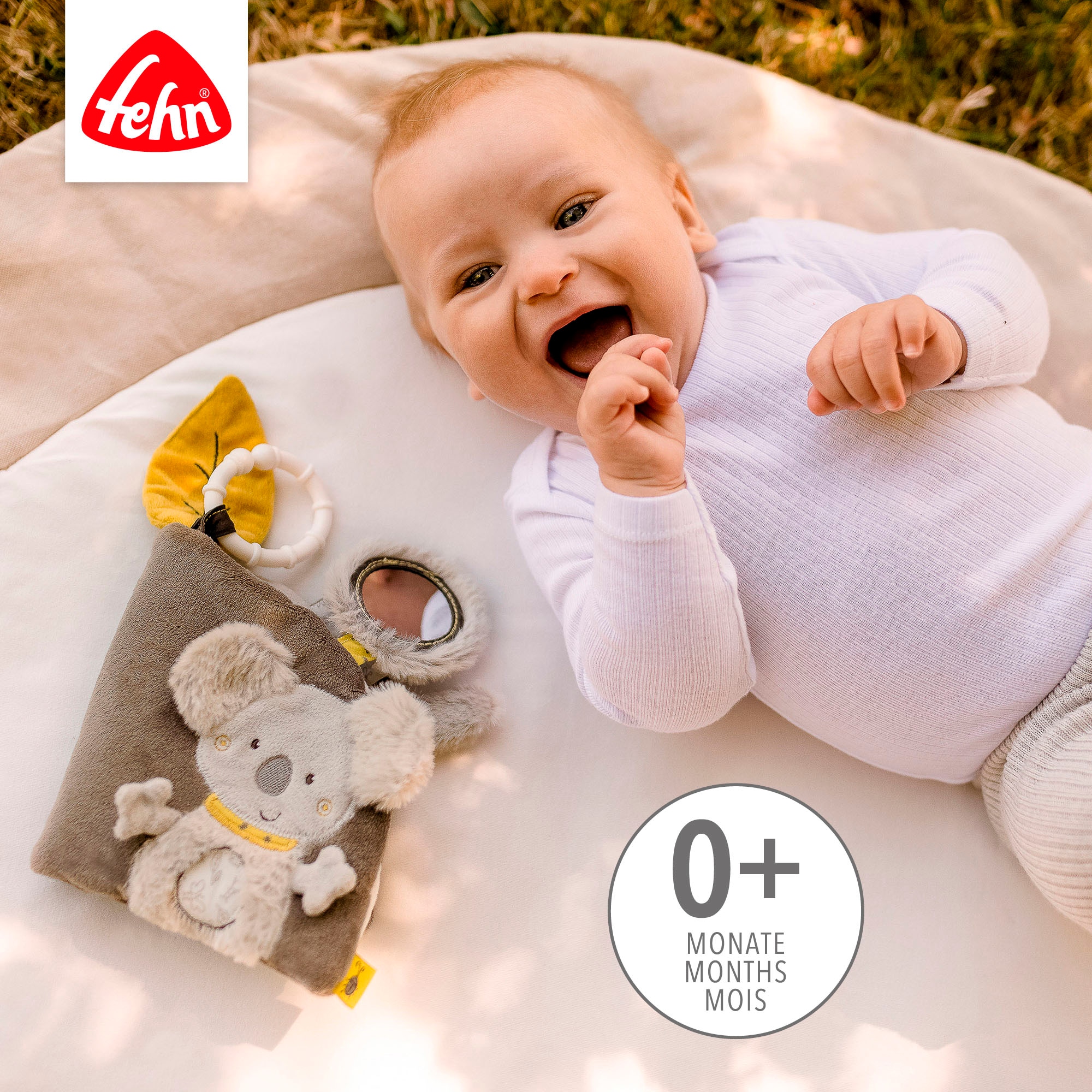 Fehn Greifspielzeug »Australia, Stoffbuch« mit Ring zur Befestigung an Kinderwagen, Babyschale oder Bett