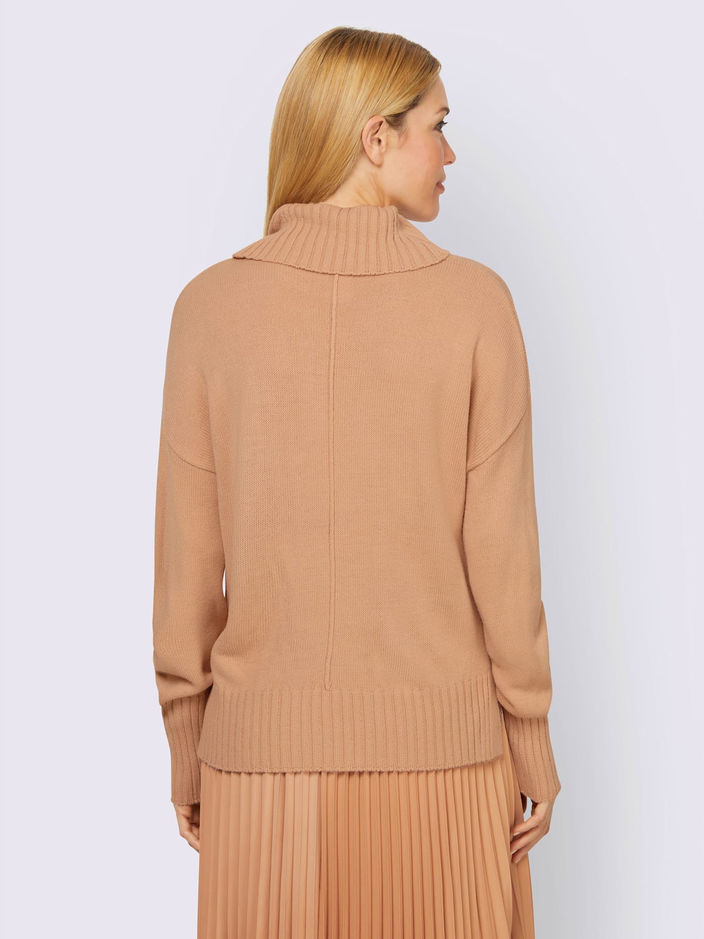 Pull col roulé flatteur