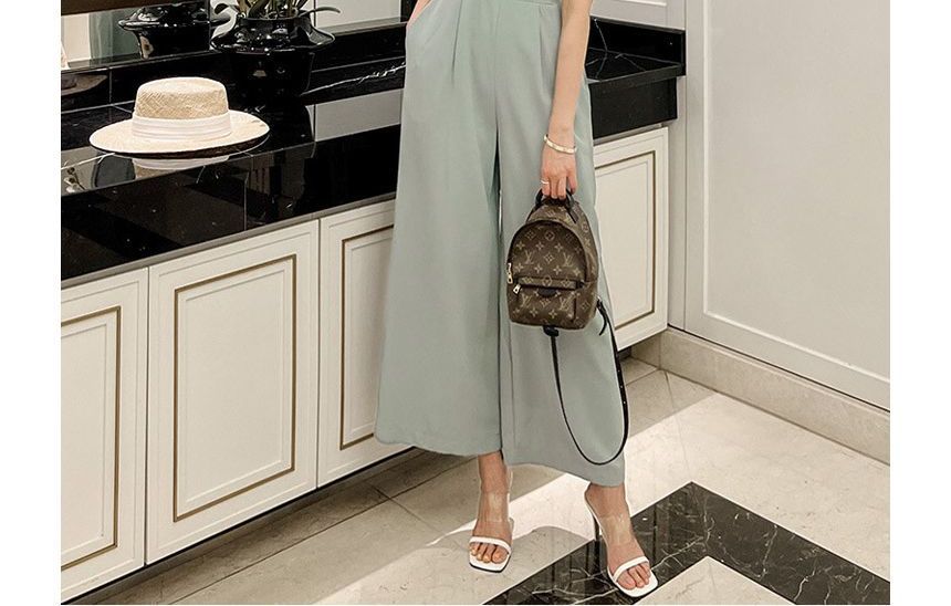 Cassidy - Mouwloze jumpsuit met vierkante hals, effen cropped en wijde pijpen