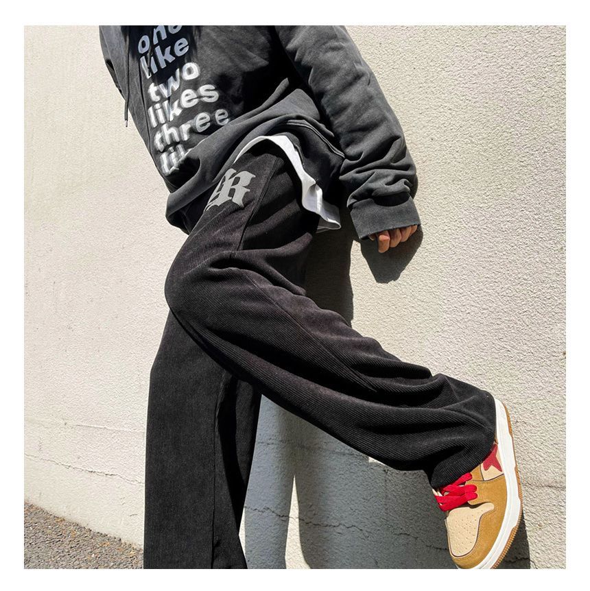 FOEV - Joggingbroek met trekkoord en letters