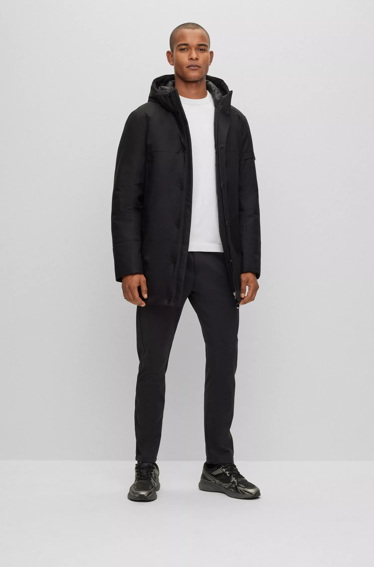 Jaqueta parka BOSS verde-repelente à água com bolso com logotipo na manga