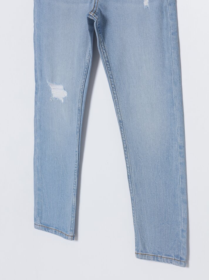 Calça jeans skinny rasgada - Azul claro