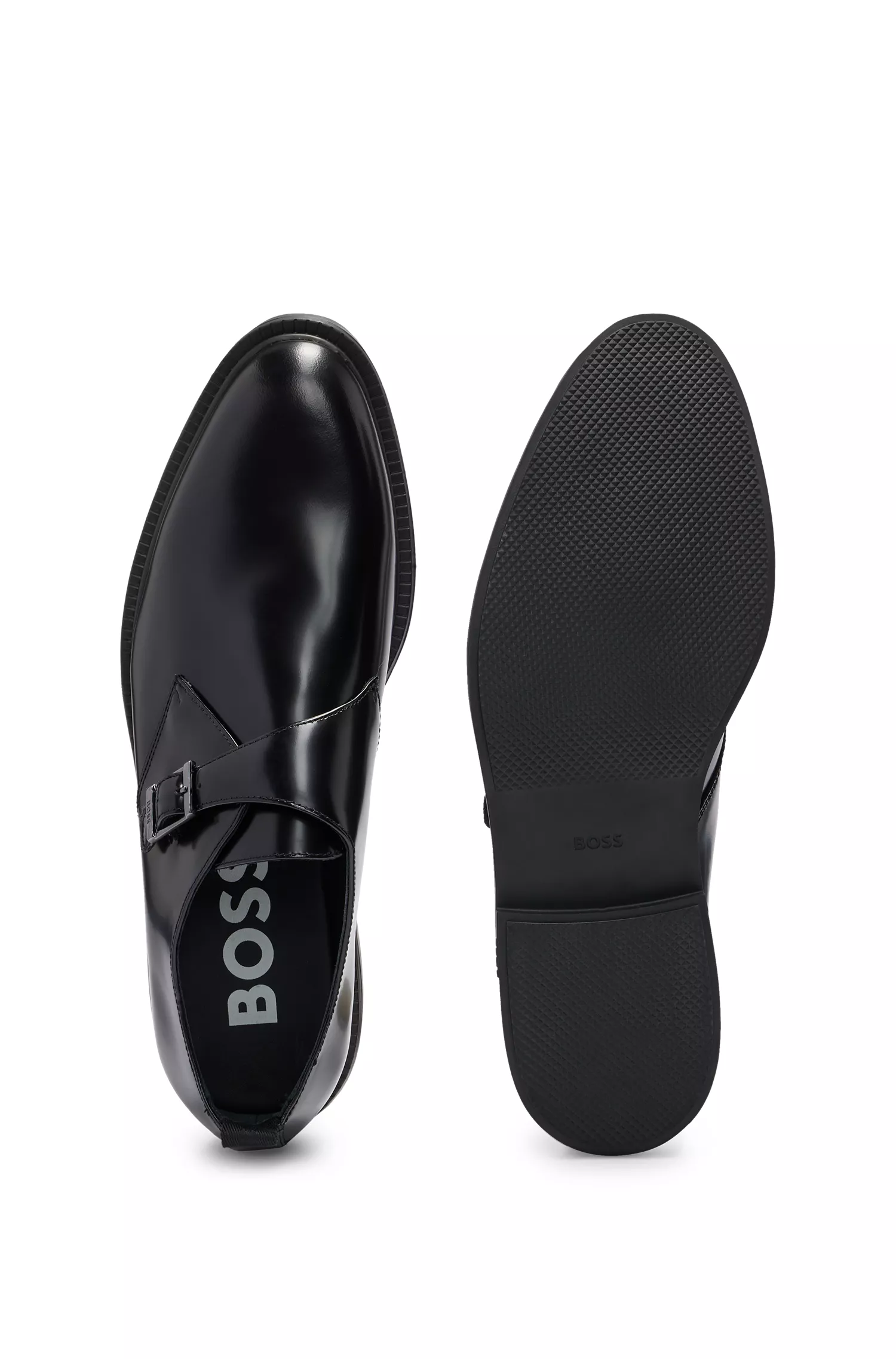 Sapatos BOSS pretos de fivela única em couro escovado.