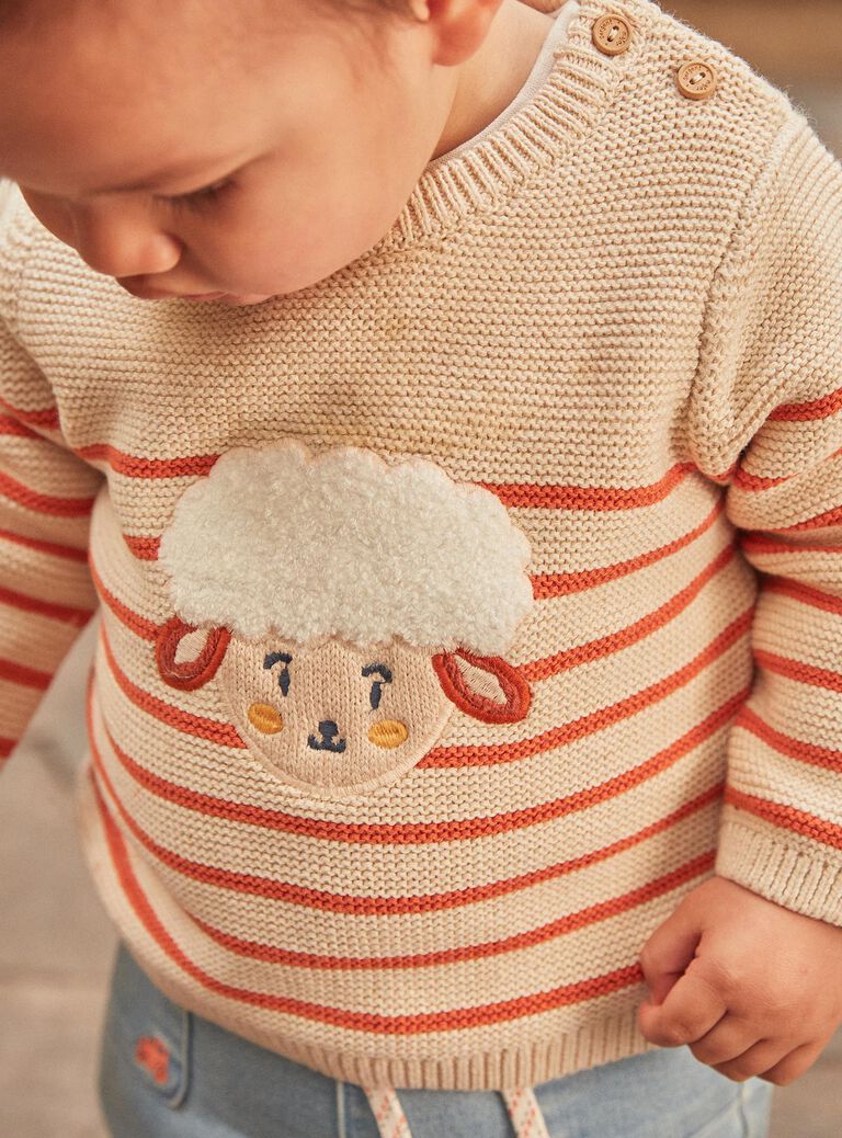 Pull beige clair à imprimé à rayures