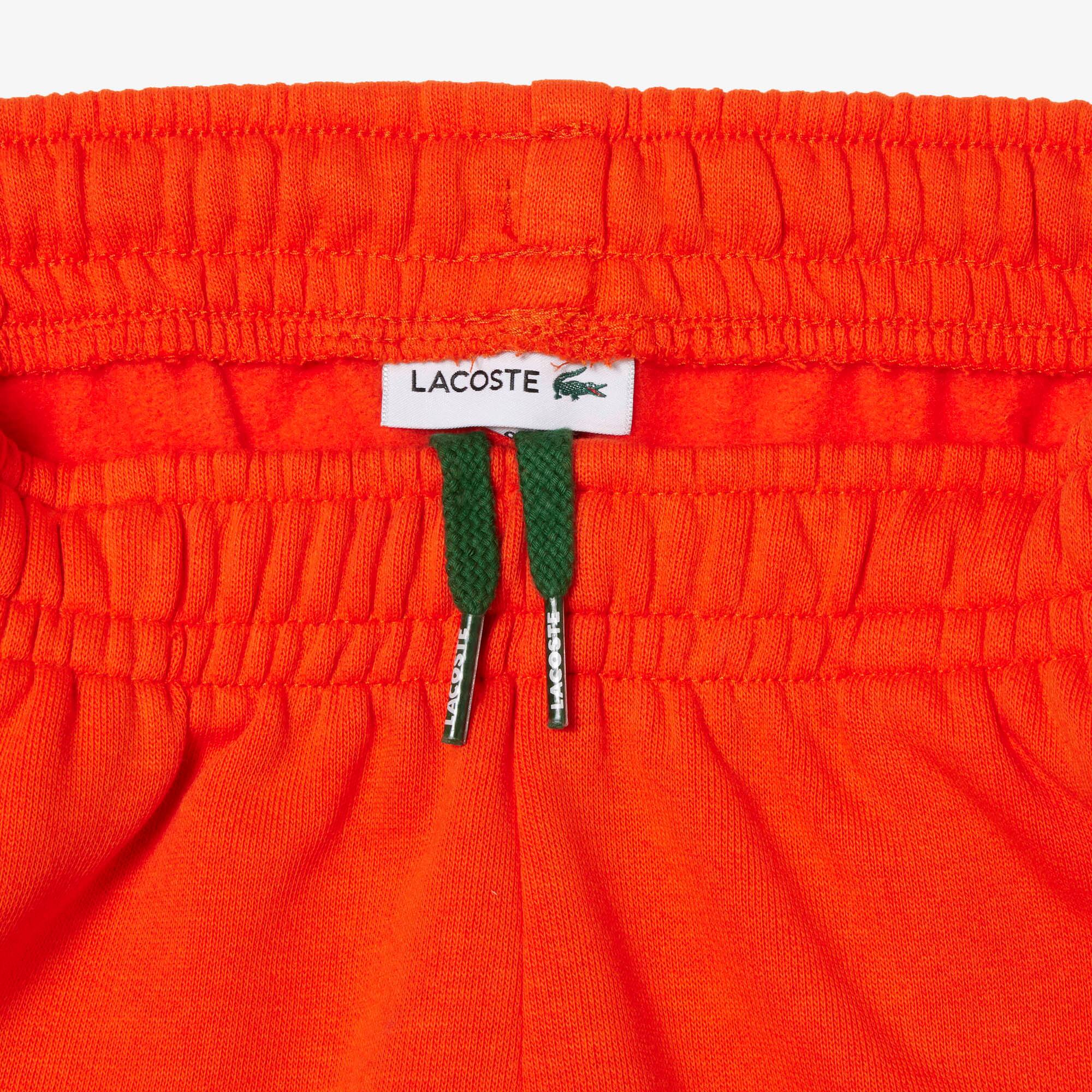 Pantalon de survêtement enfant Lacoste Pantalons & Shorts - Orange - Lacoste - Enfant