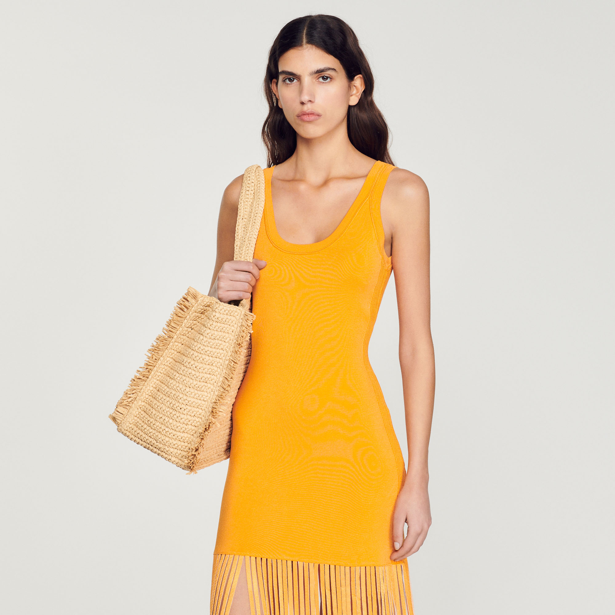 Robe en maille frangee