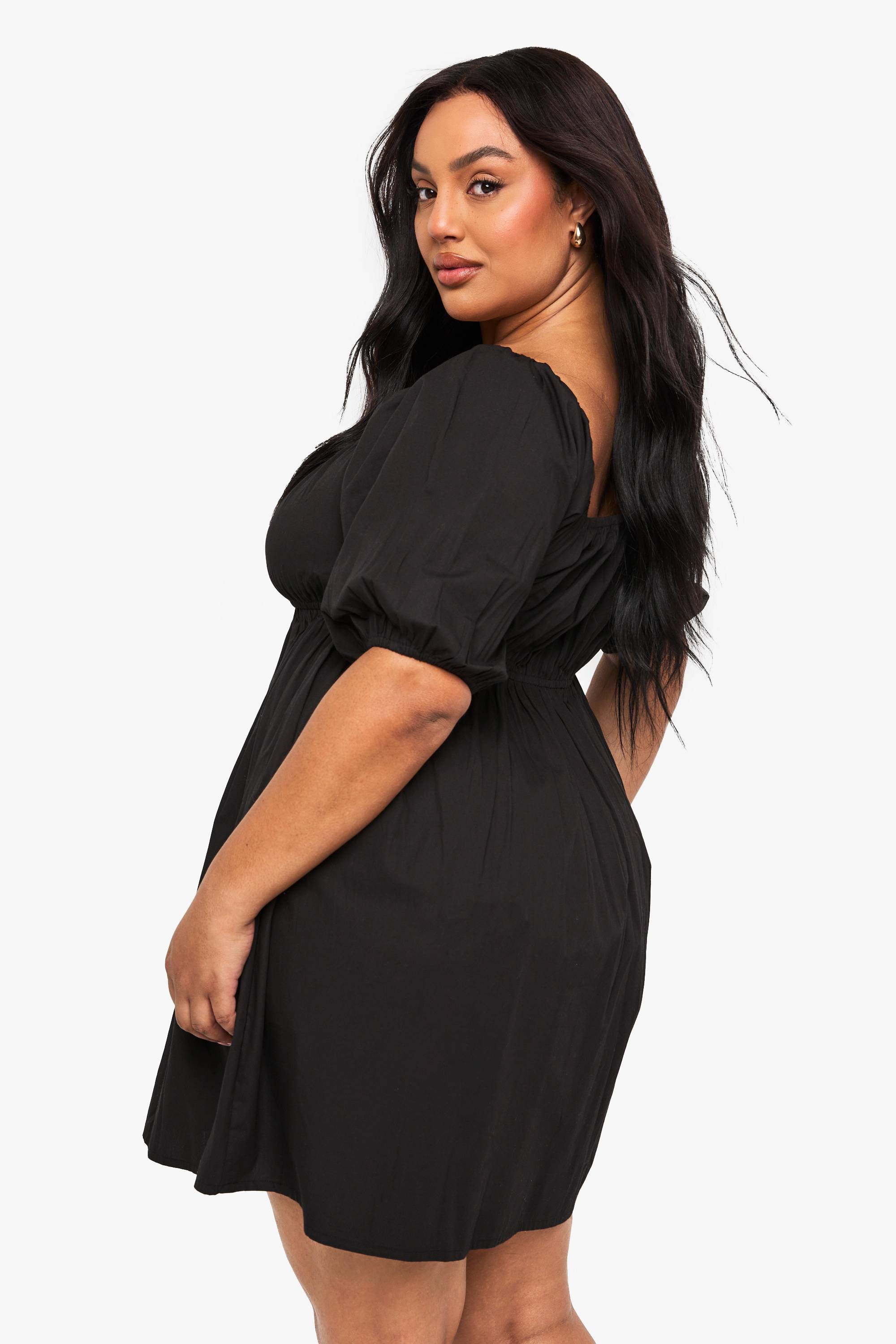 boohoo Robe skater en coton plissée avec nœud à l’avant