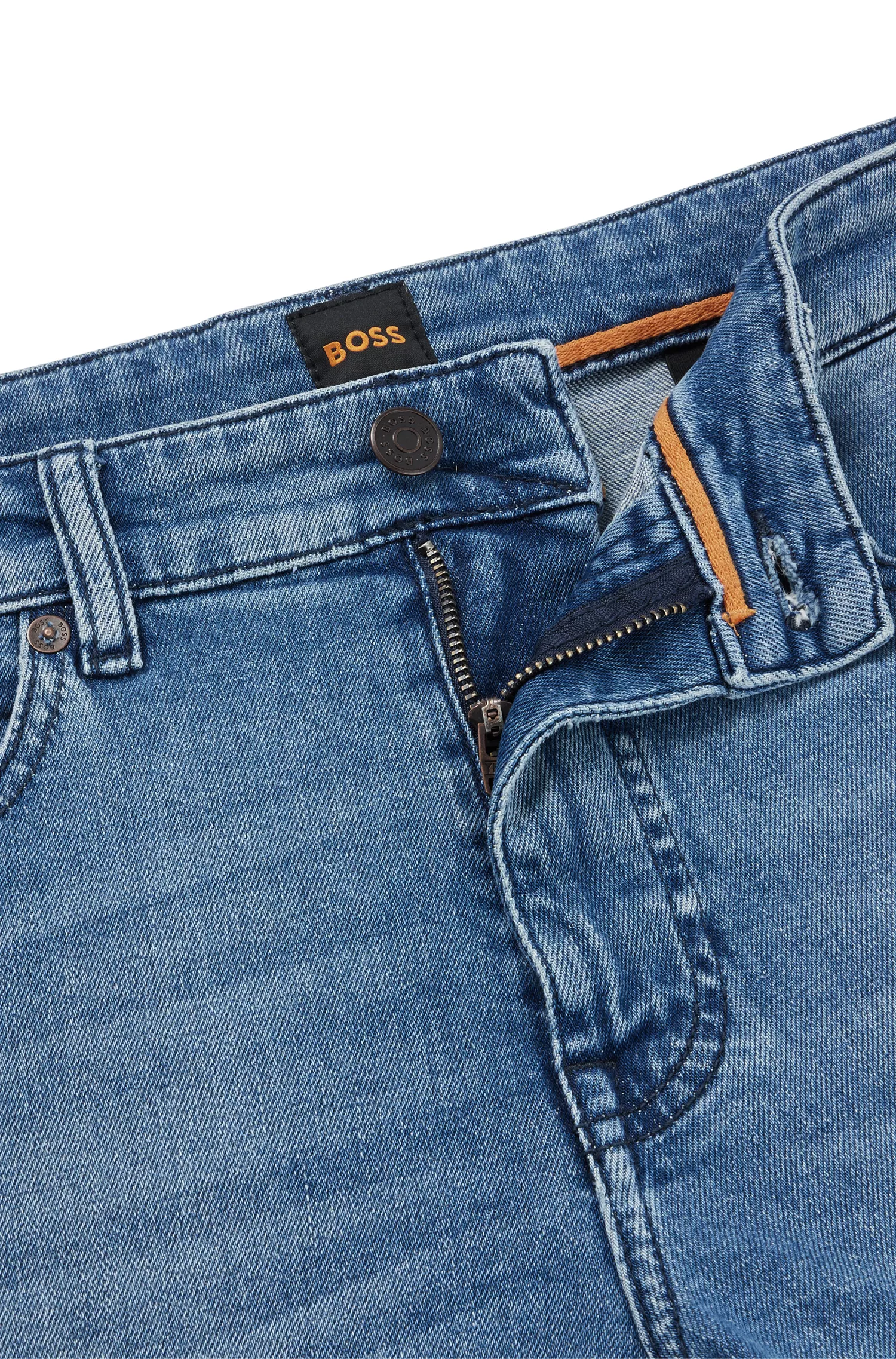 Calça jeans BOSS laranja, corte slim, em denim azul com elasticidade confortável.
