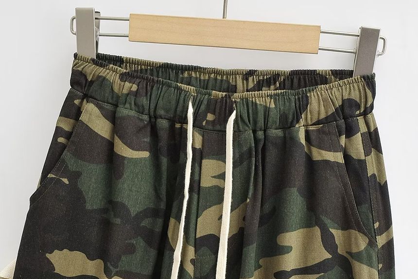 Osion - Cargobroek met wijde pijpen en middelhoge taille
