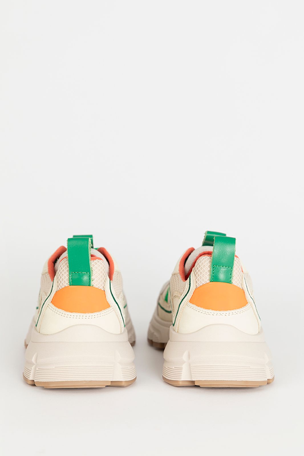 Witte sneakers met groene details