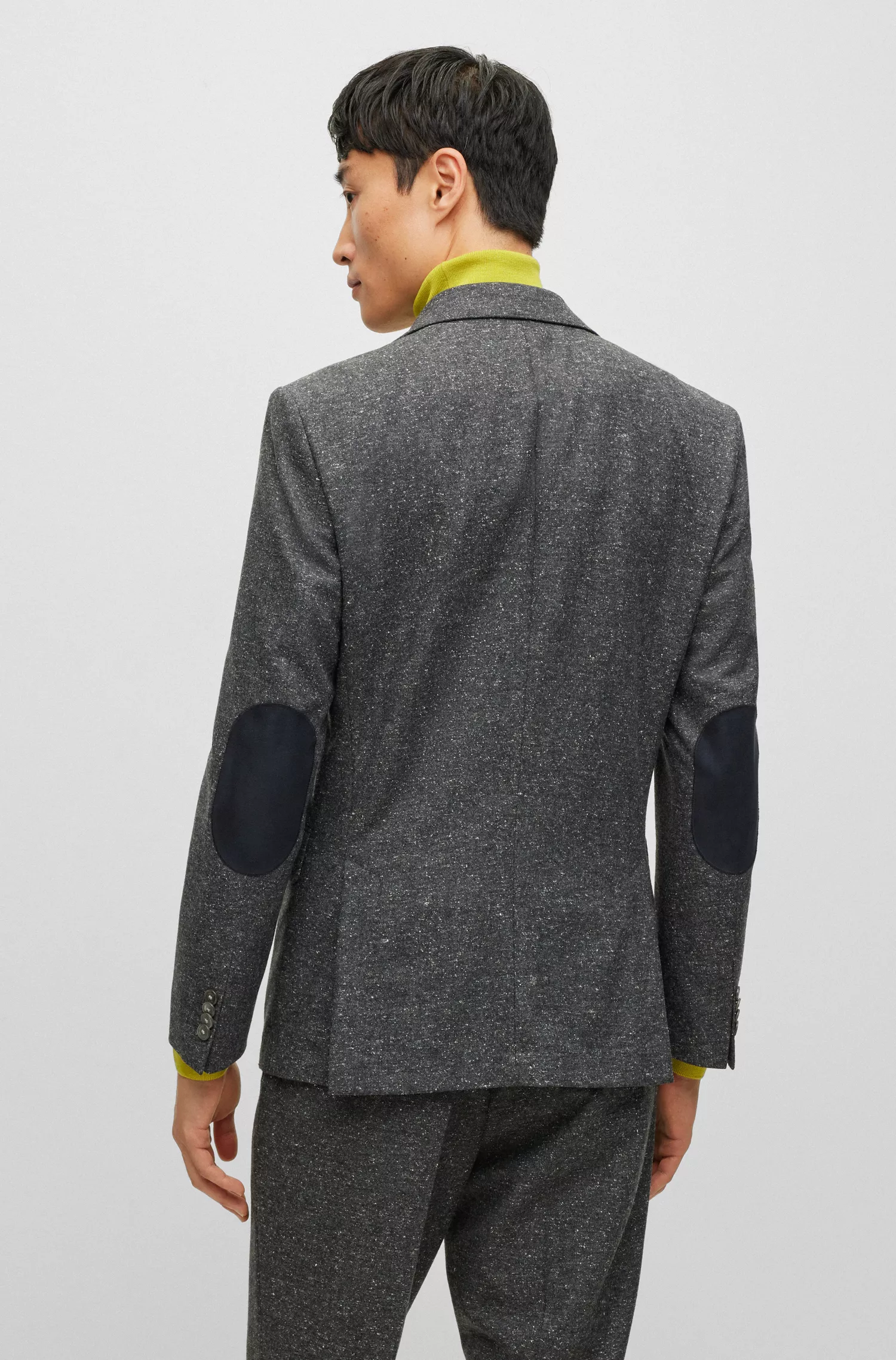 Jaqueta BOSS preta de corte slim em mistura de lã com microestampa.