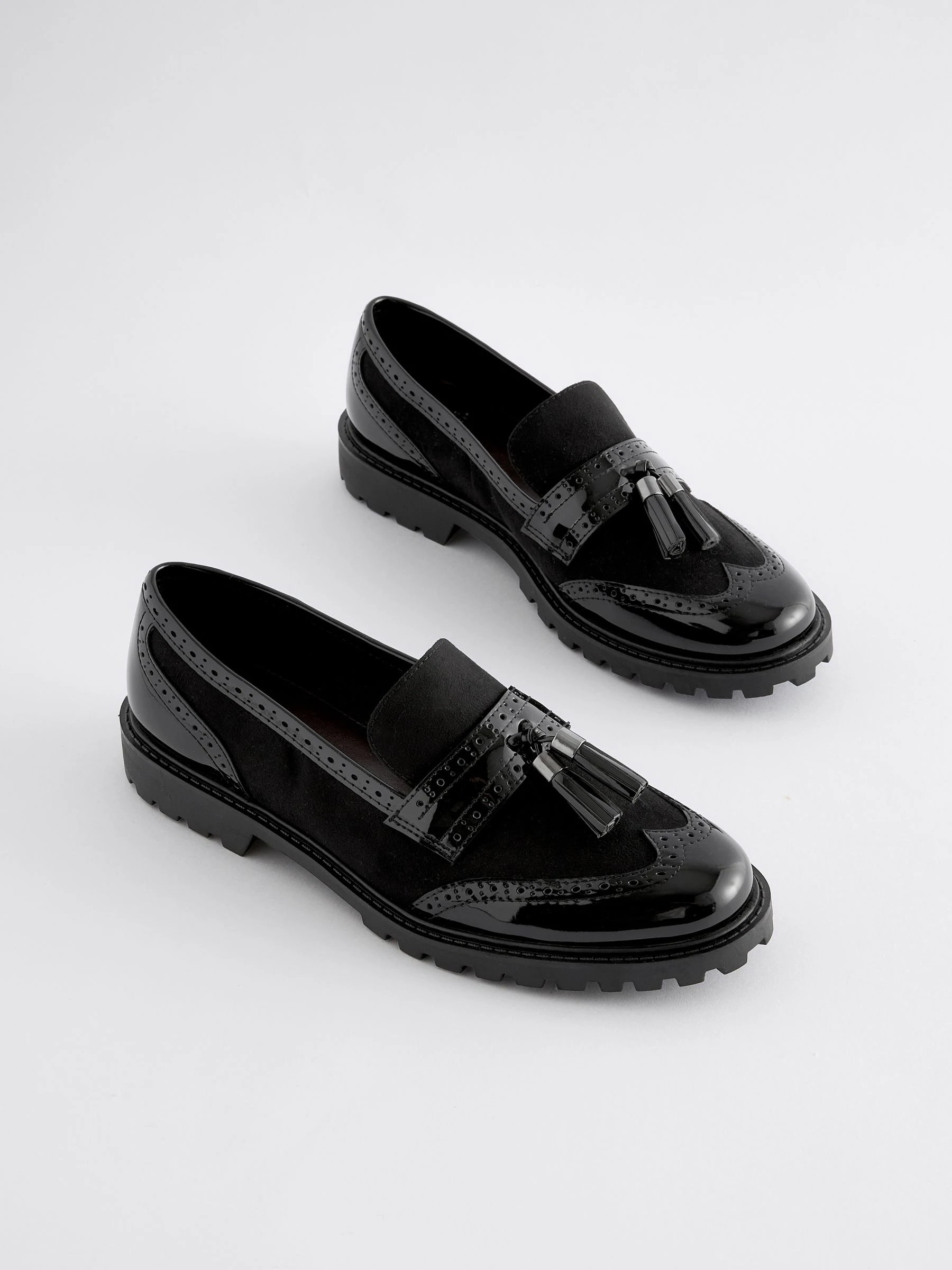 Zwarte mix - Loafers met dikke zool met profiel en kwastjes