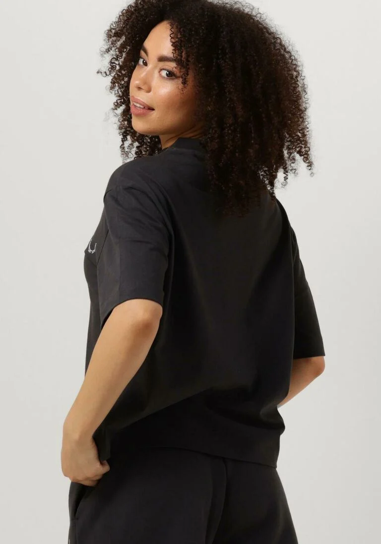 CATWALK JUNKIE zwarte catwalk junkie t-shirt ts slow down