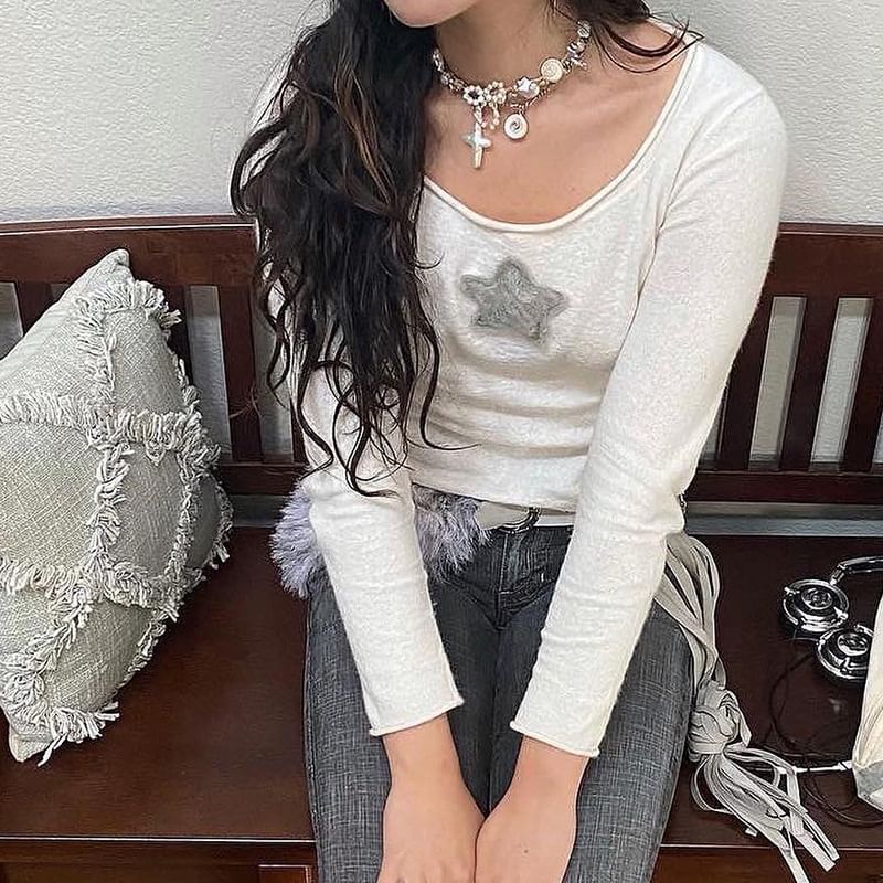 Sosana - Top met lange mouwen en sterrenappliqué