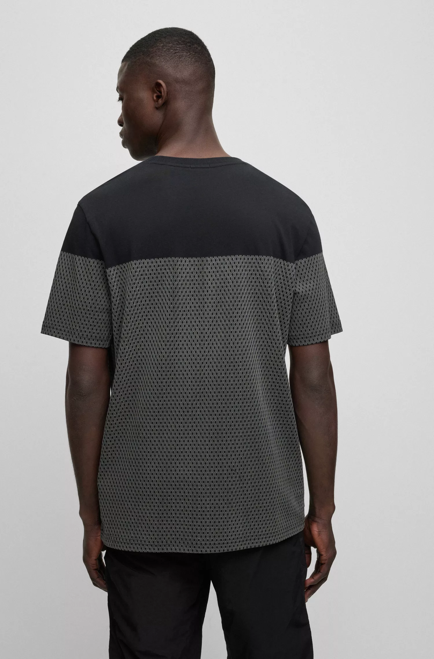 Camiseta BOSS laranja, modelagem relaxada, em algodão, com estampa em relevo com efeito de tela.