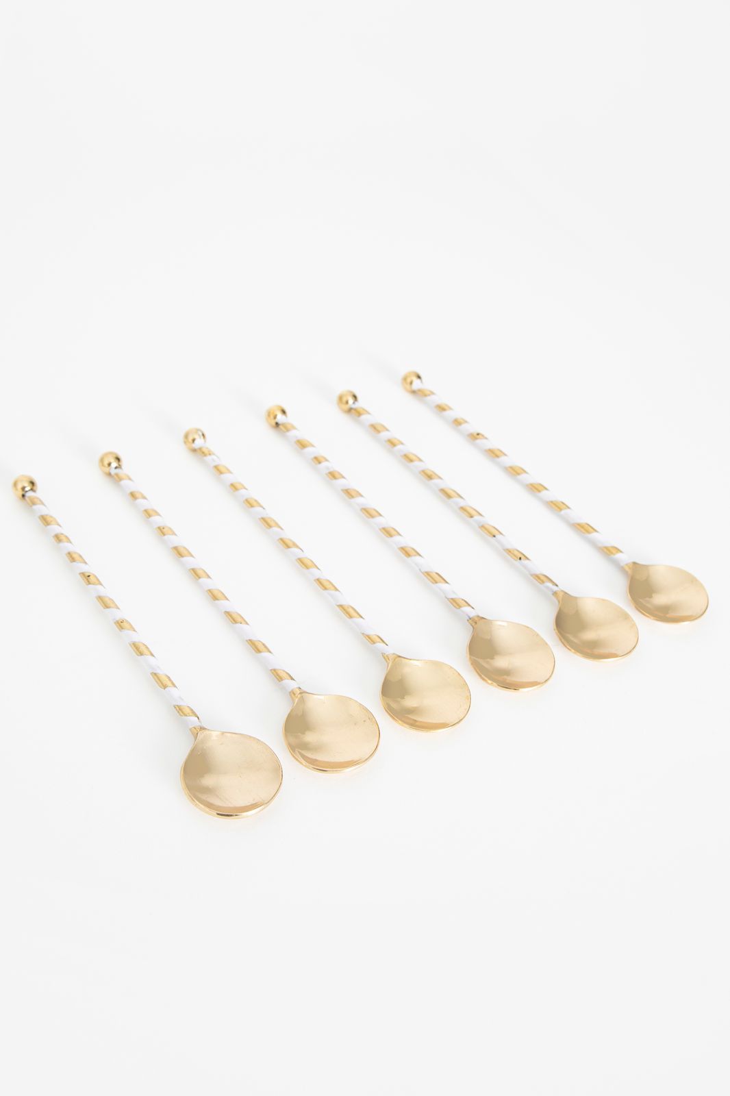 Goudkleurige latte lepel circus lichtpaars