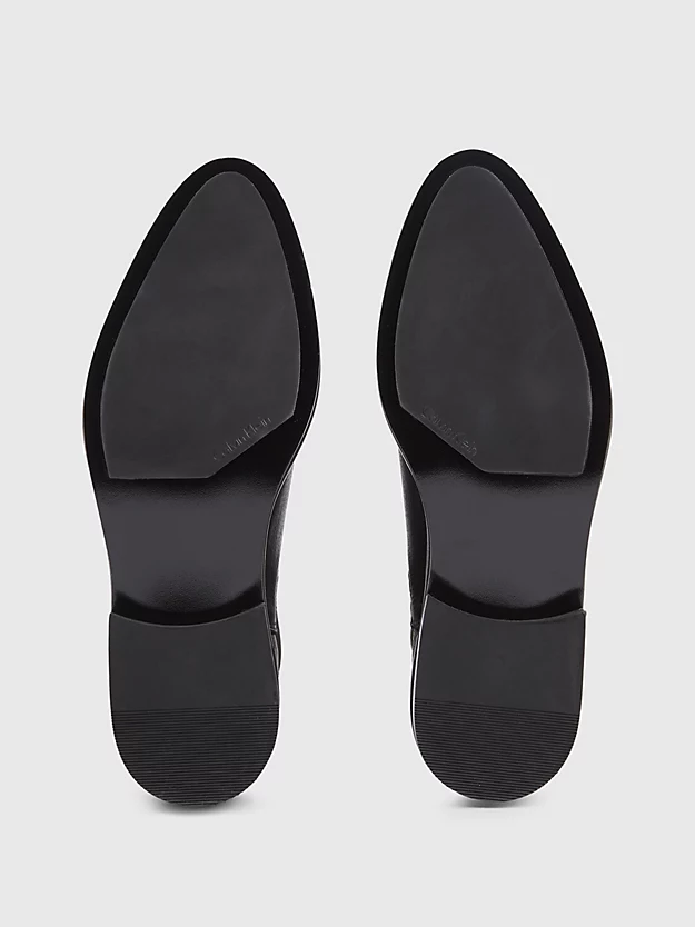 botas de couro até o tornozelo