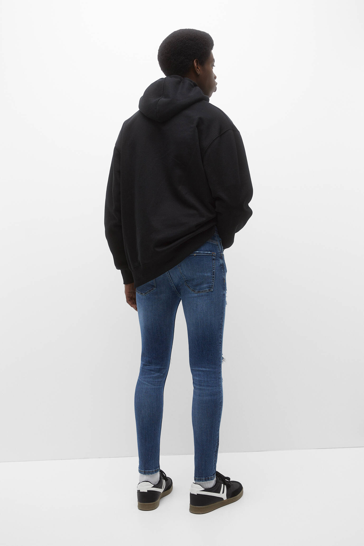 CALÇA JEANS SUPER SKINNY RASGADA - AZUL MÉDIO