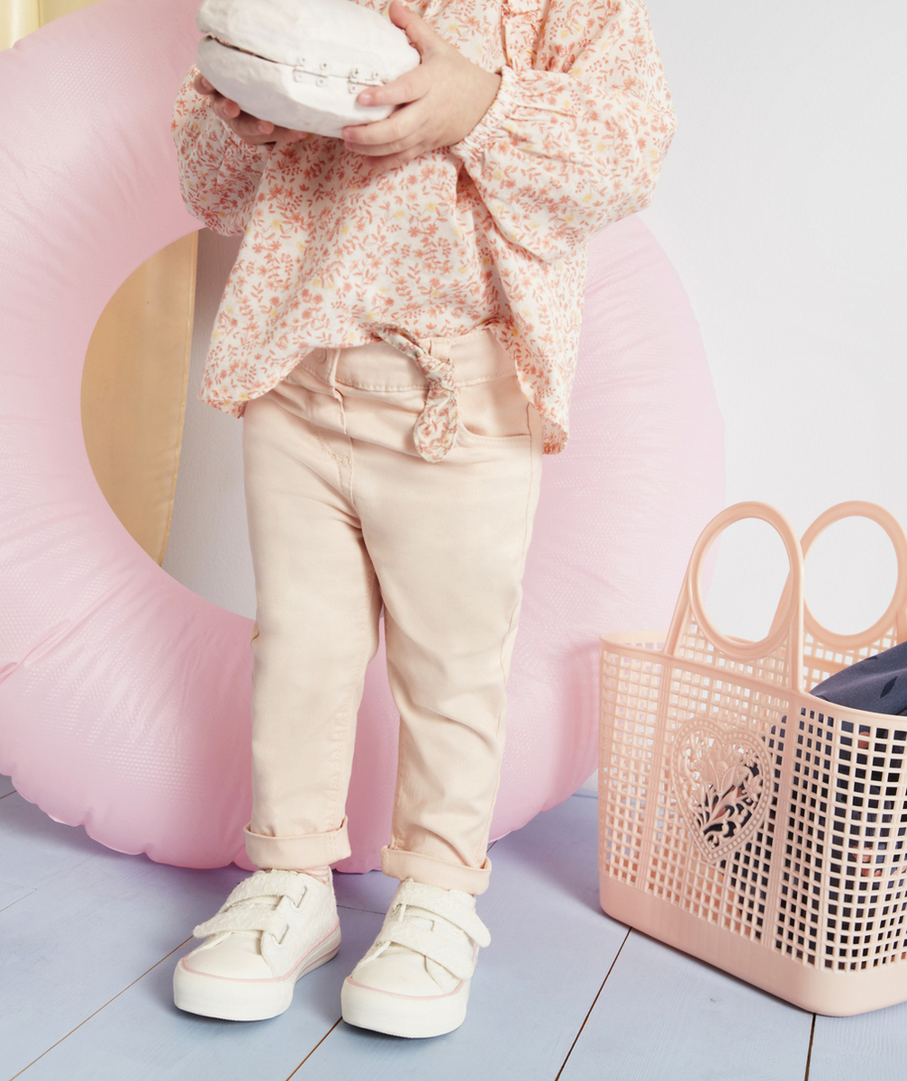 PANTALON SLIM BÉBÉ FILLE ROSE AVEC NOEUD FLEURI