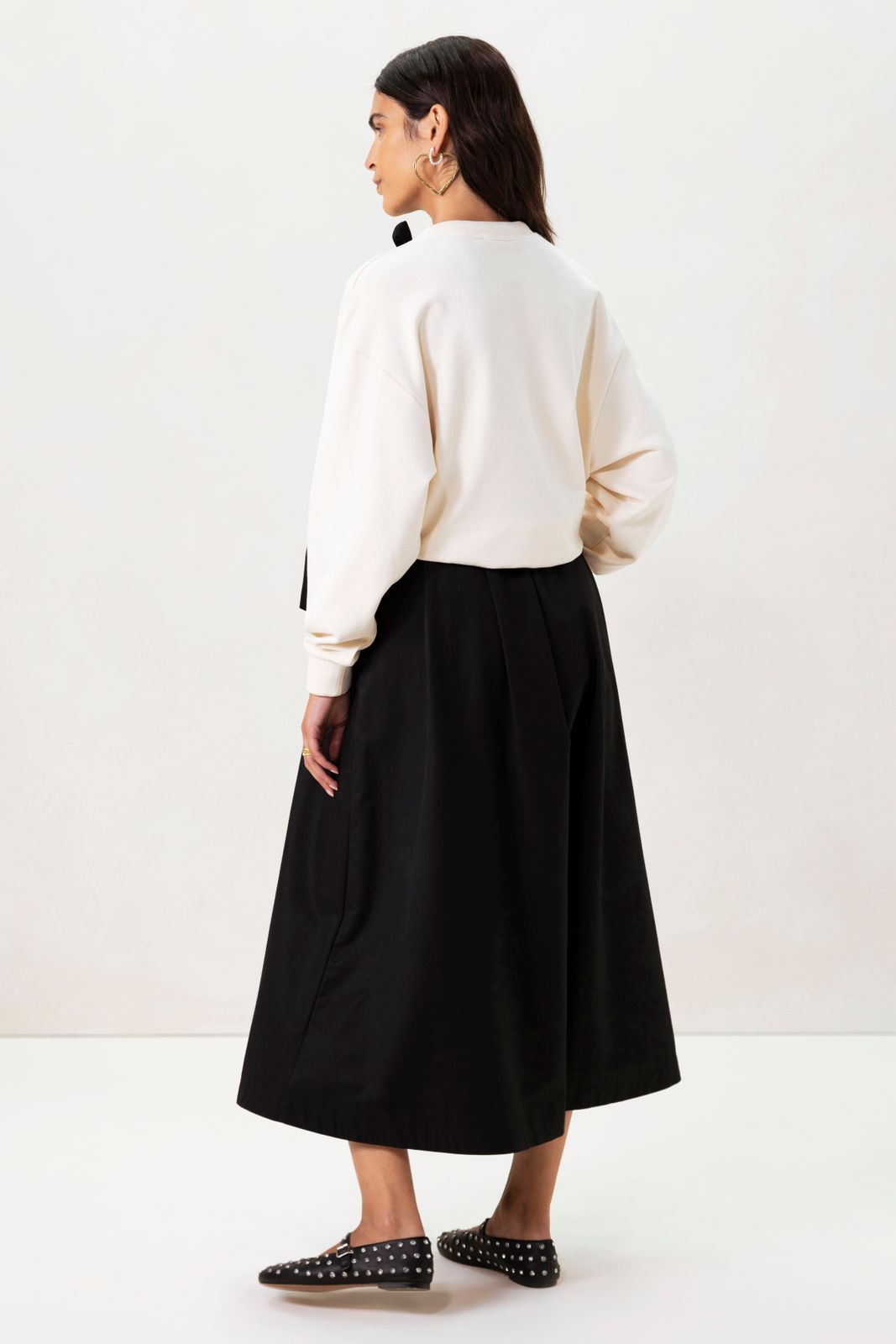 Witte sweater met strik