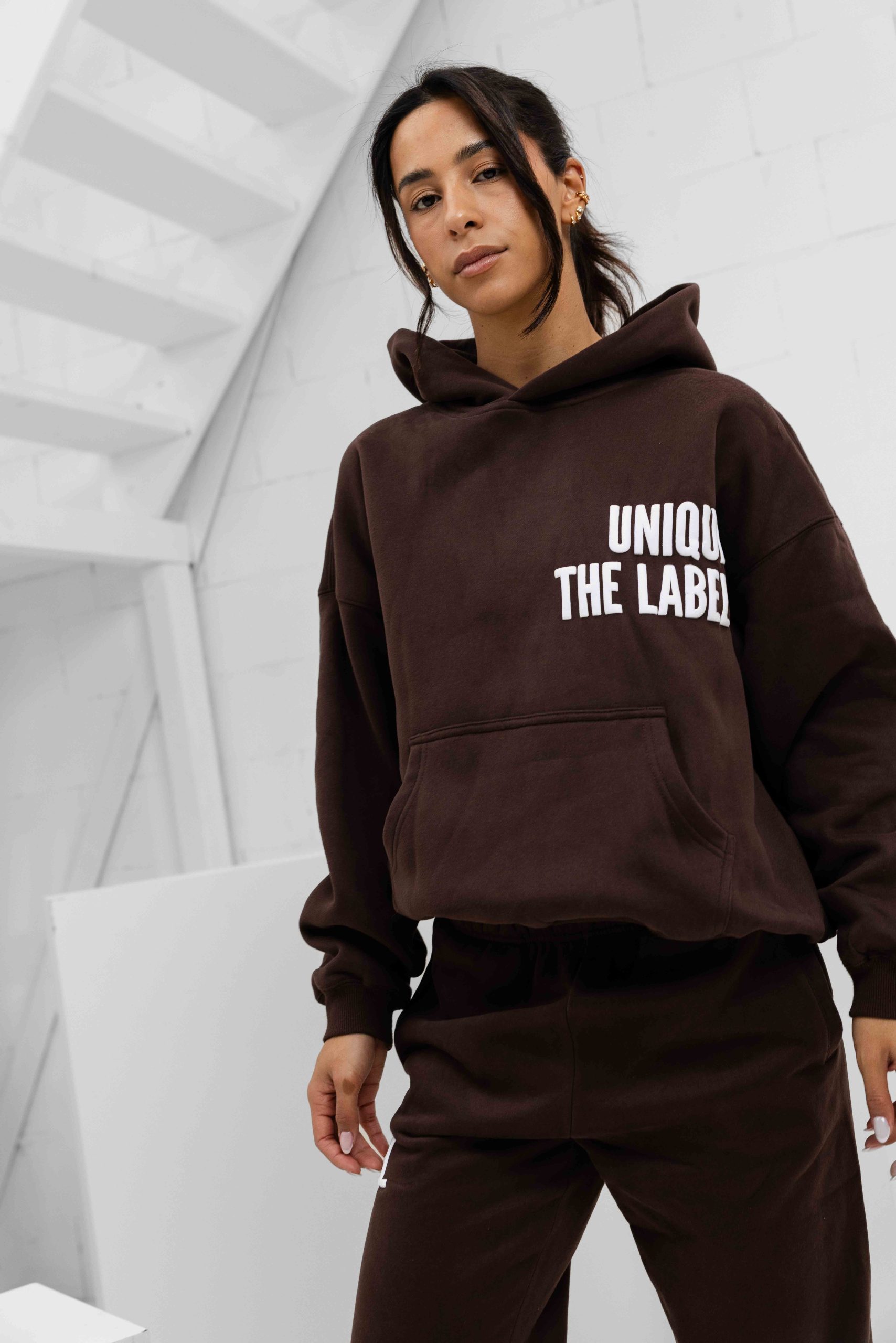 Unique The Label Elyana Trainingspak Dames Donkerbruin