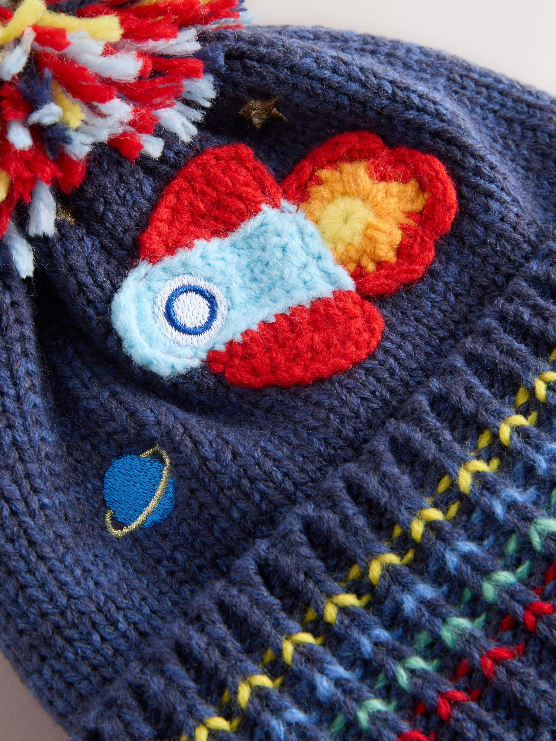 Marineblauw met raket - Beanie-muts met oorbedekking en pompon (3mnd -10jr)