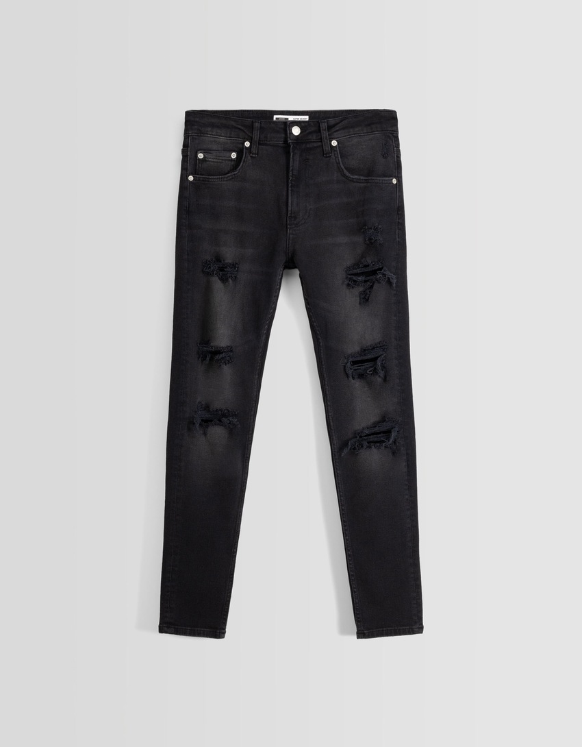 calça jeans super skinny rasgada