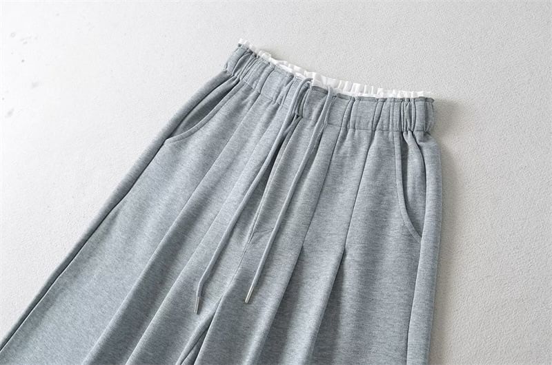 Larlige - Tweedelige joggingbroek met trekkoord en wijde pijpen