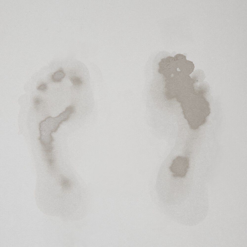 Tapis de salle de bain blanc magique