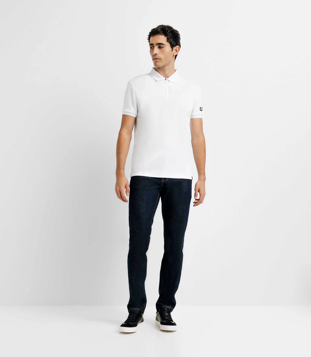 Polo col zippé avec patch blanc