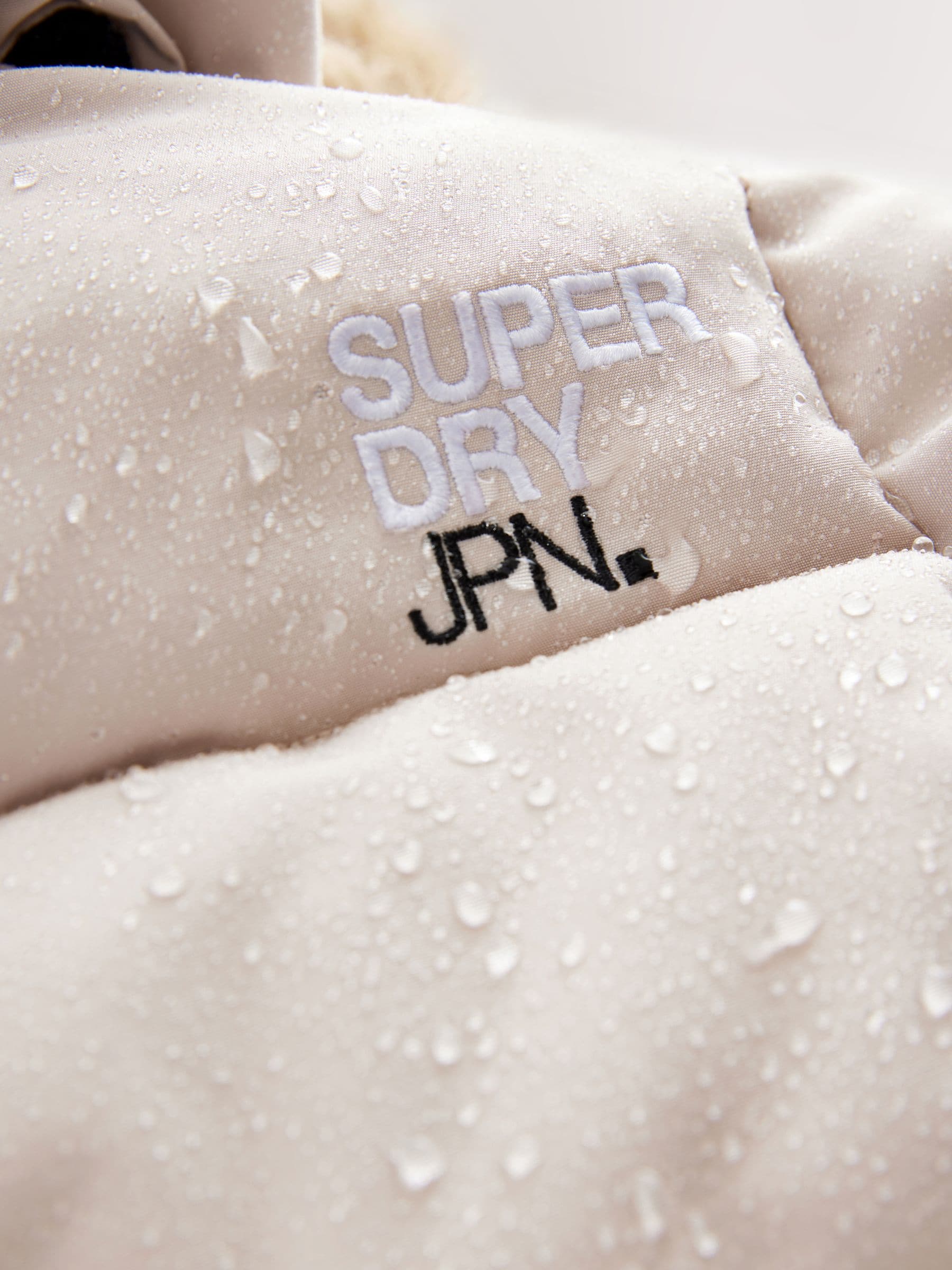 Crème - Superdry - Everest lange gewatteerde jas