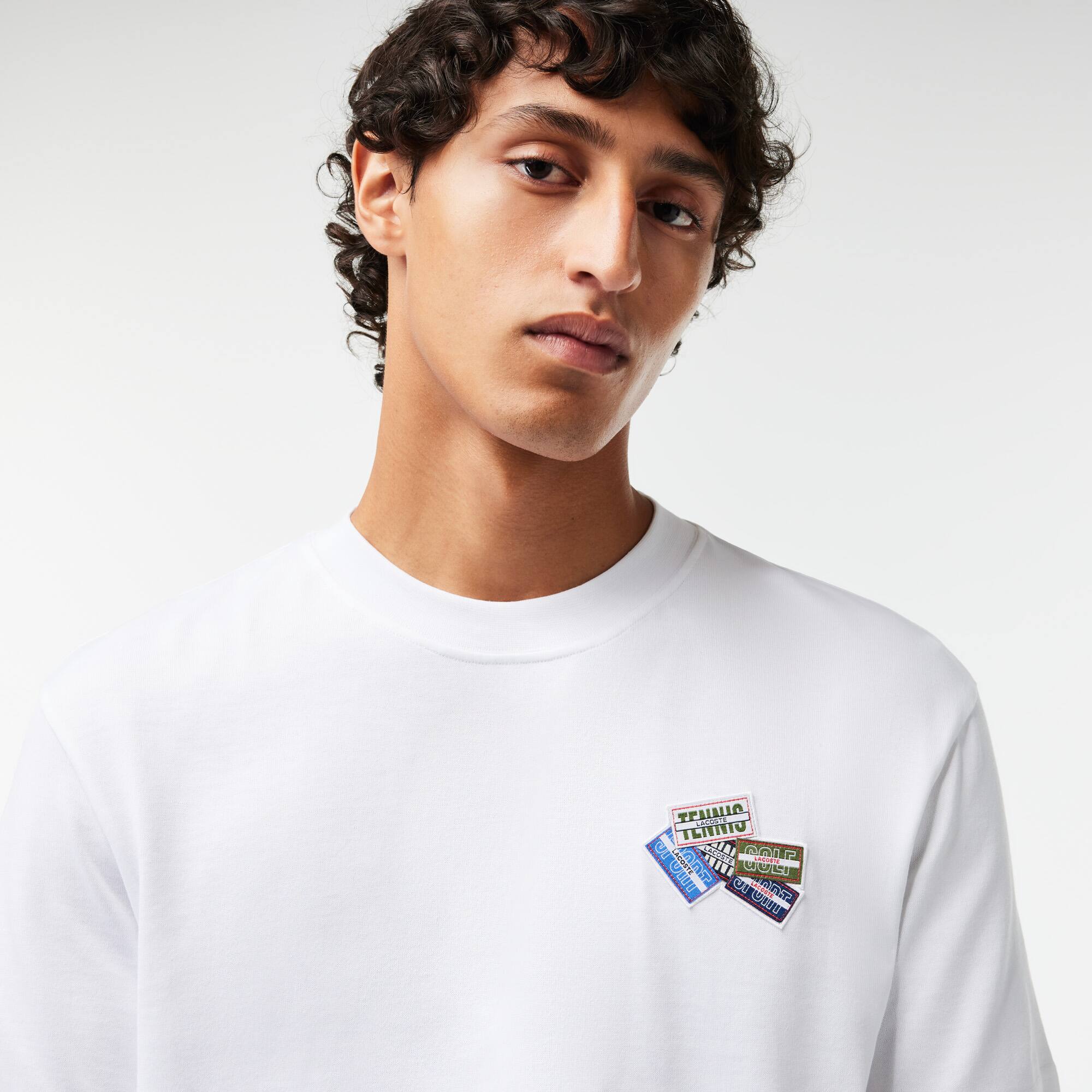 T-Shirt aus robustem Baumwolljersey mit vielen Aufnähern. T-Shirts - Weiss - Lacoste - Herren
