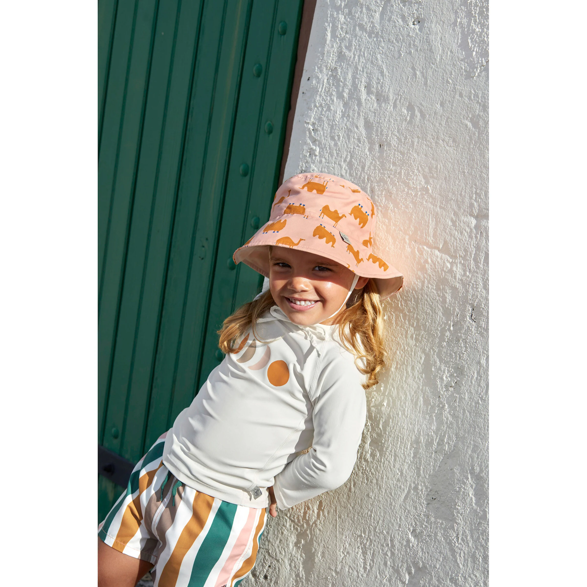 Lässig Wende-Sonnenhut mit UV-Schutz Kamele rosa/orange