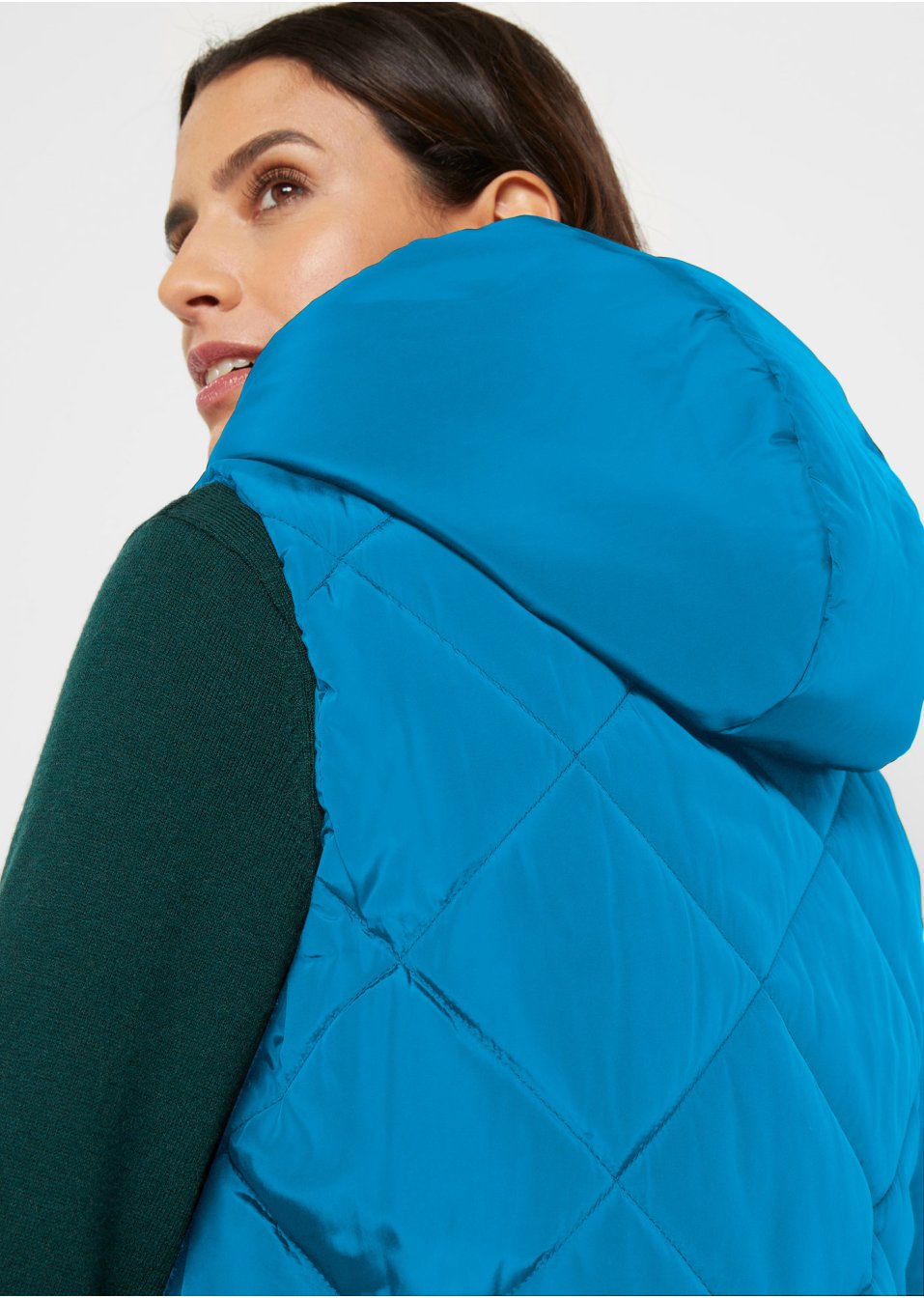 Veste matelassée sans manches asymétrique