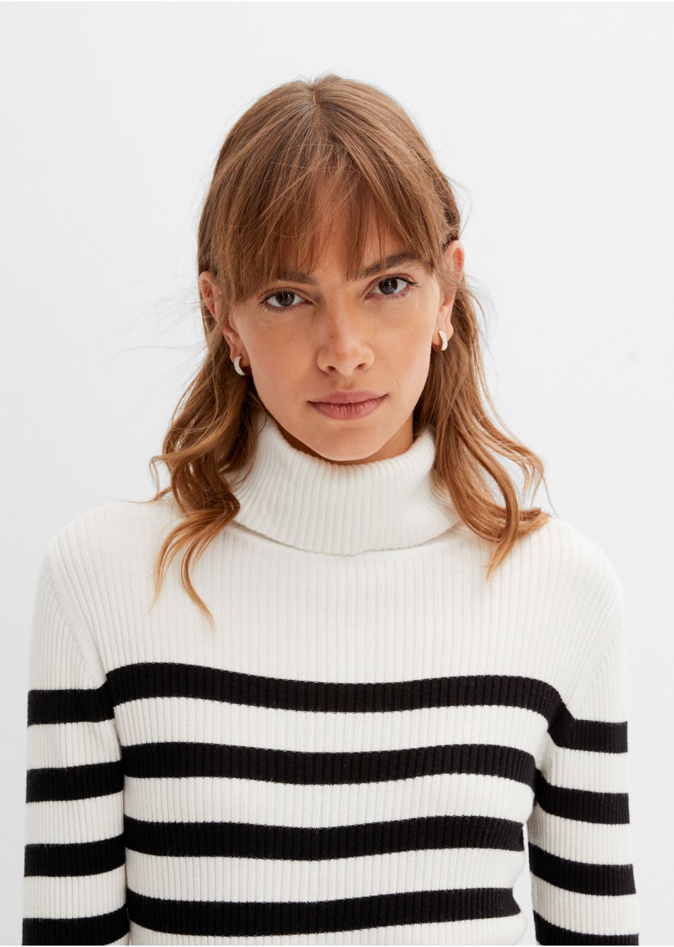 Pull col roulé rayé