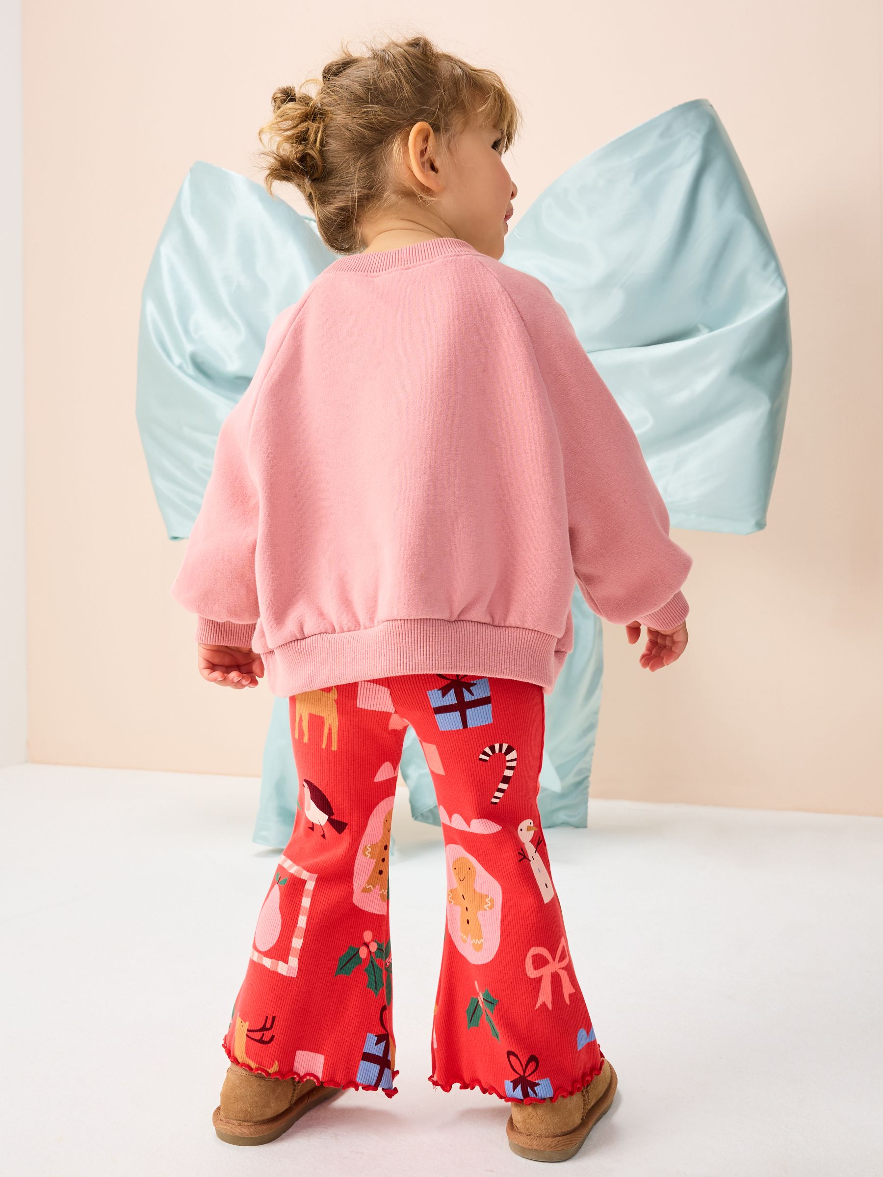 Rode kerstman - Geribbelde legging met uitlopende pijpen (3mnd-7jr)