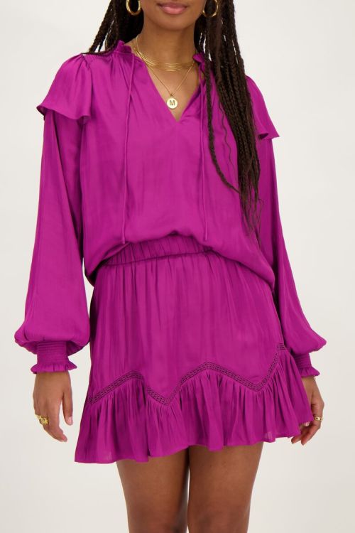 Paarse blouse met ruffles satijnen look