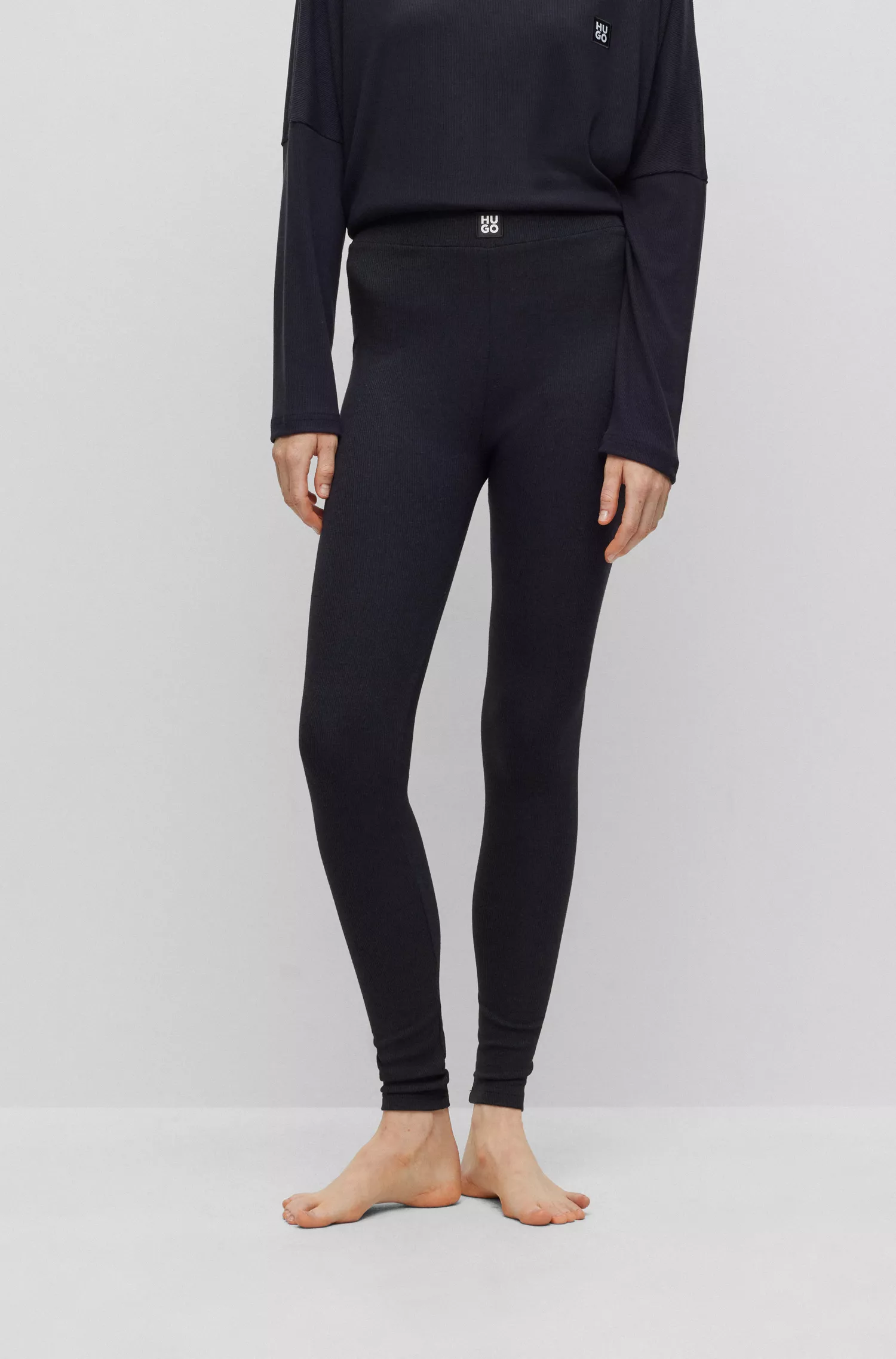 Calça legging de pijama HUGO vermelha, modelagem skinny, com cós com logo.