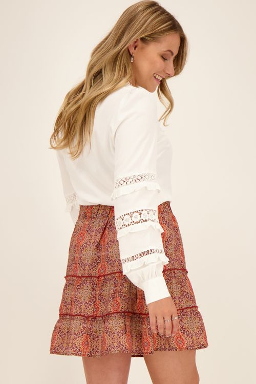 Witte blouse met kanten details