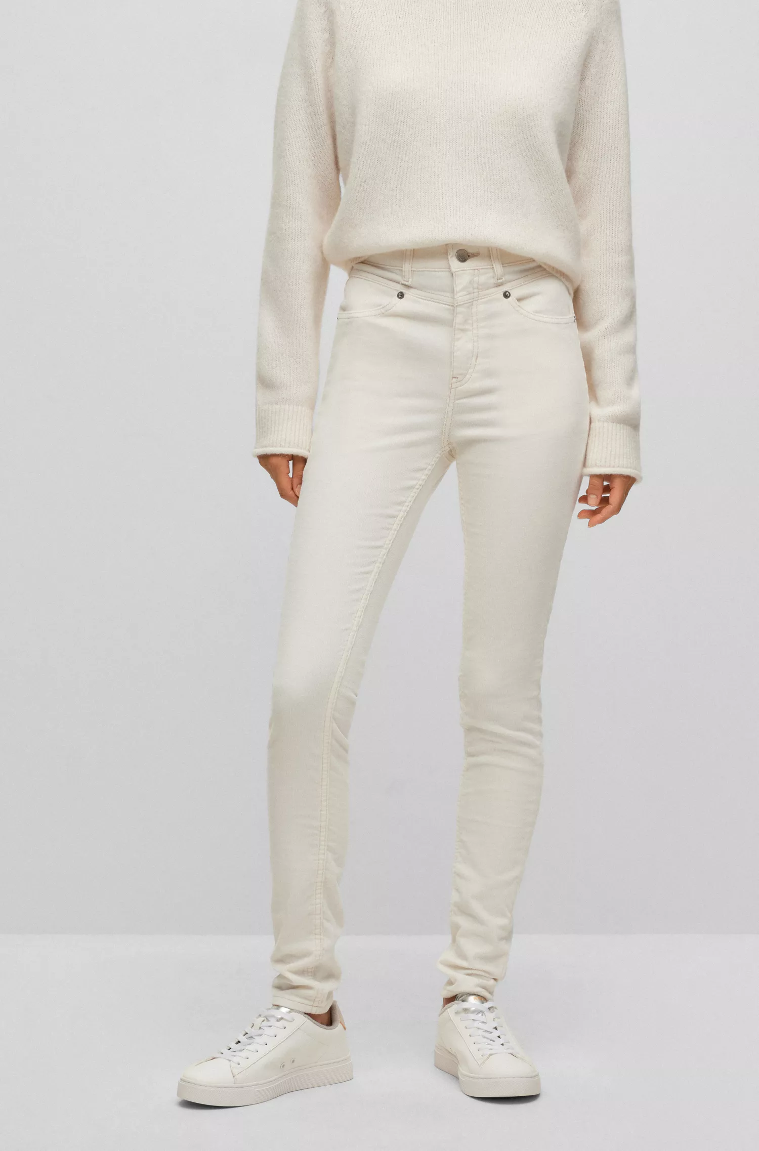 Calça jeans BOSS laranja de cintura alta em veludo cotelê de algodão elástico.