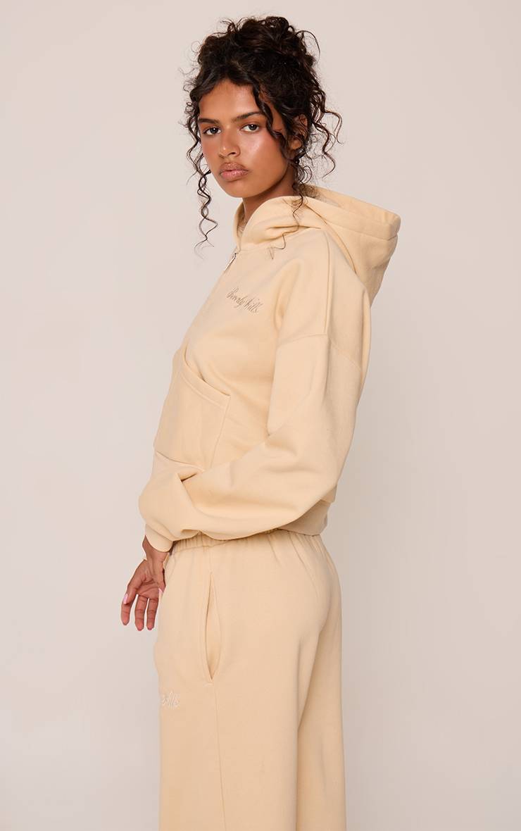 Butter Cream Sweat À Casynthétiqueche Brodé Beverly Hills Double Zip