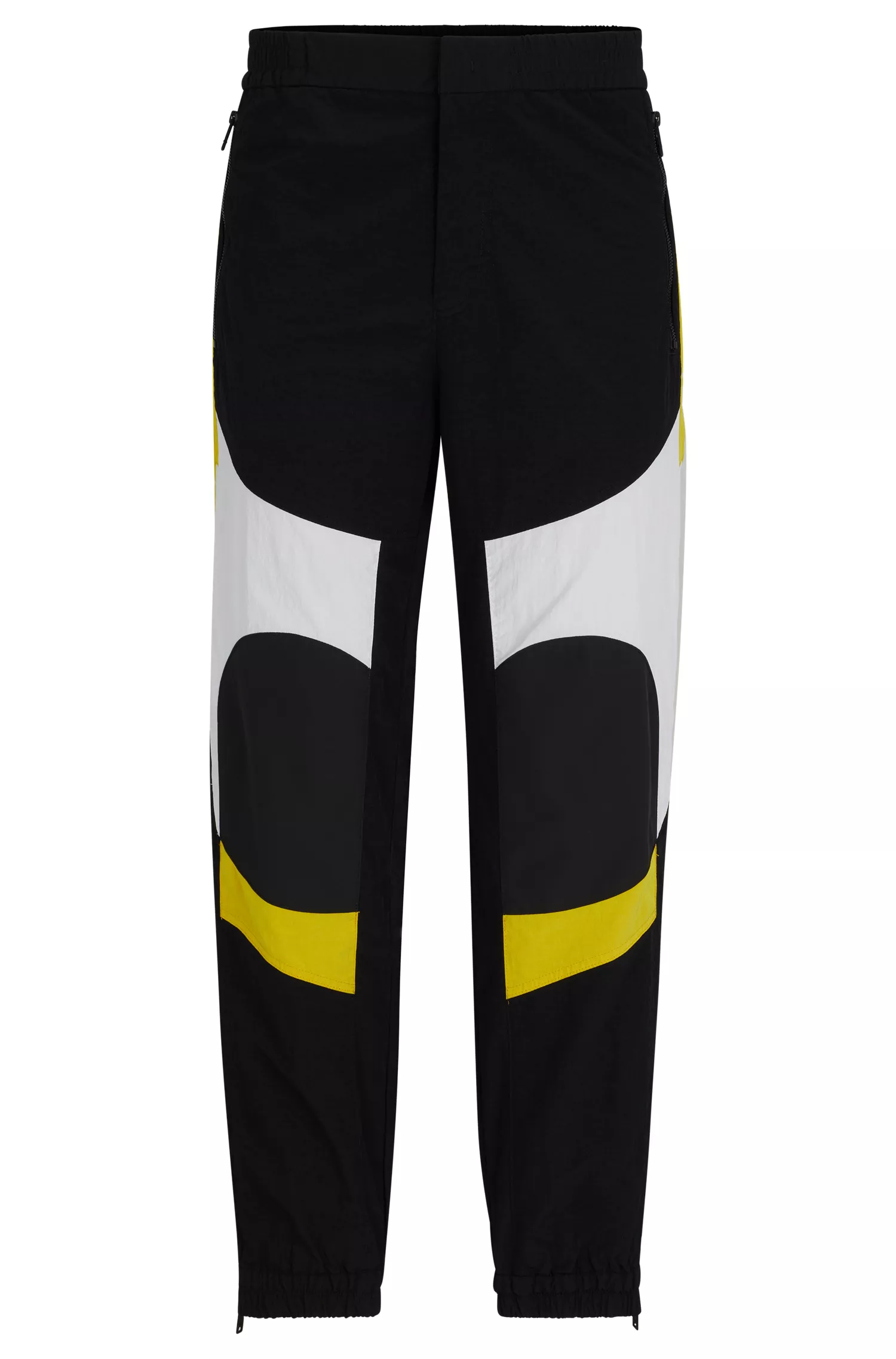 Calça BOSS laranja, corte relaxado, em tecido ripstop repelente à água.