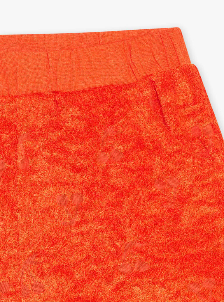 Short orange en éponge